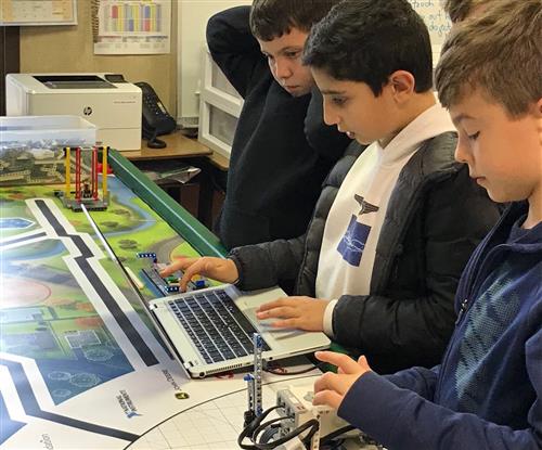 students using laptop